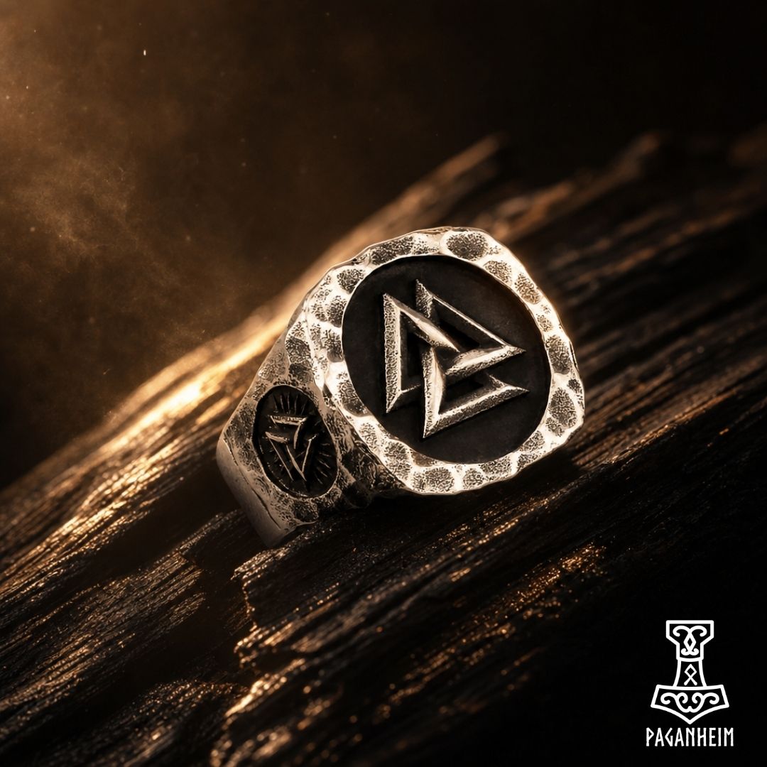 Closeup of Norse ring showing Vegvísir compass engraving on side