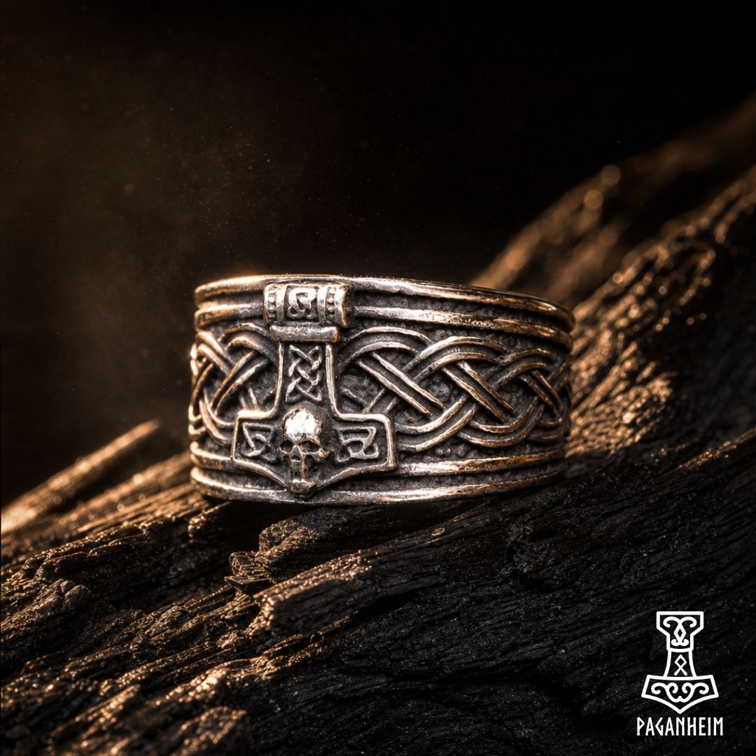 Mjölnir ring with skull accent and Web of Wyrd pattern symbolising fate and strength