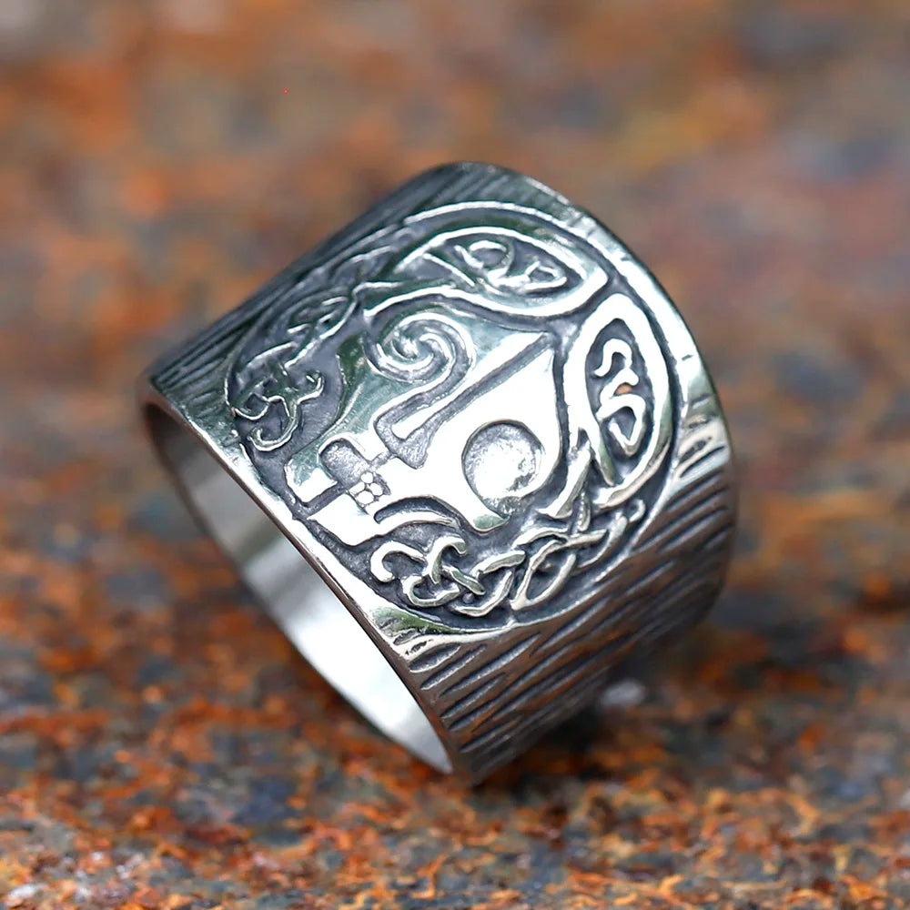 Intricate details of Hel's dual-natured face on mythological ring