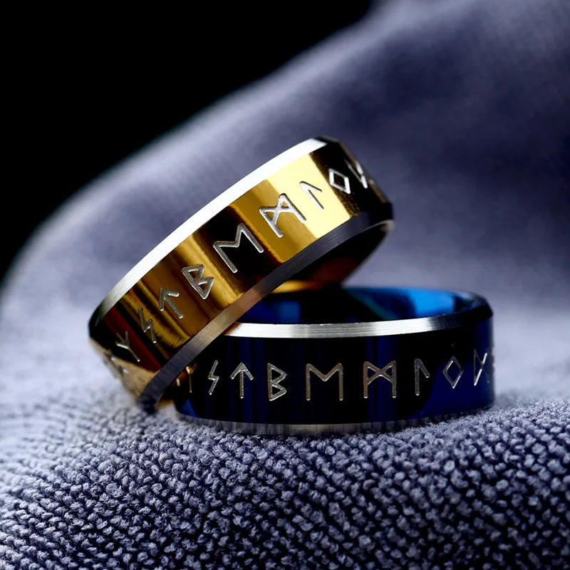 Minimalist blue ring etched with Elder Futhark runes