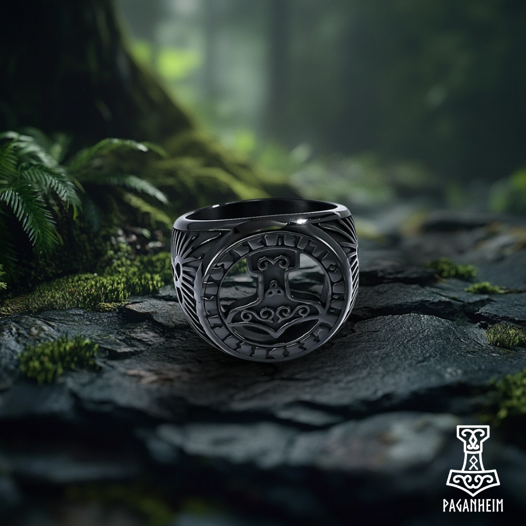 Black Mjölnir ring with triquetra symbol, inspired by historical Skåne pendant.