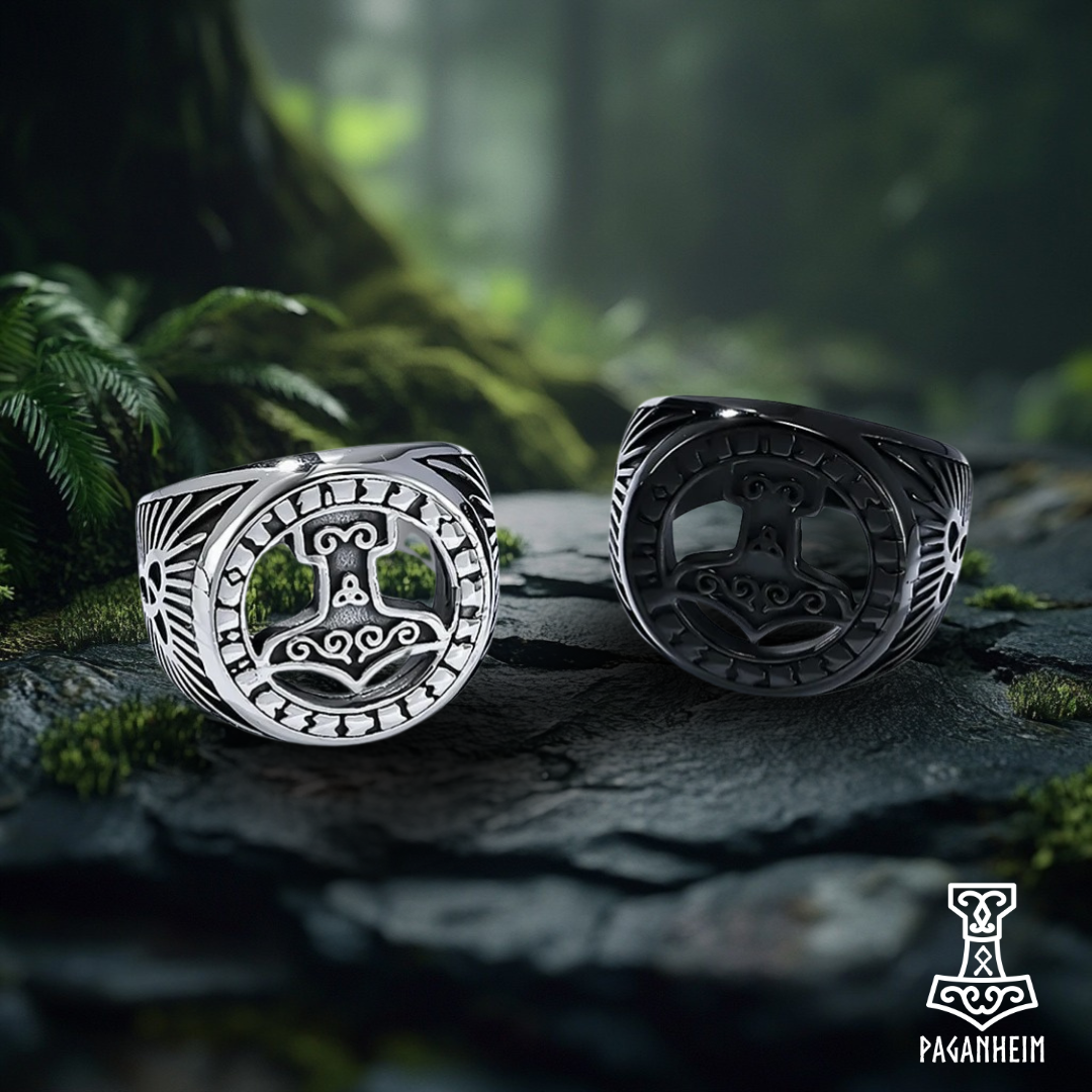 Norse-inspired Mjölnir ring with engraved triquetra symbols.