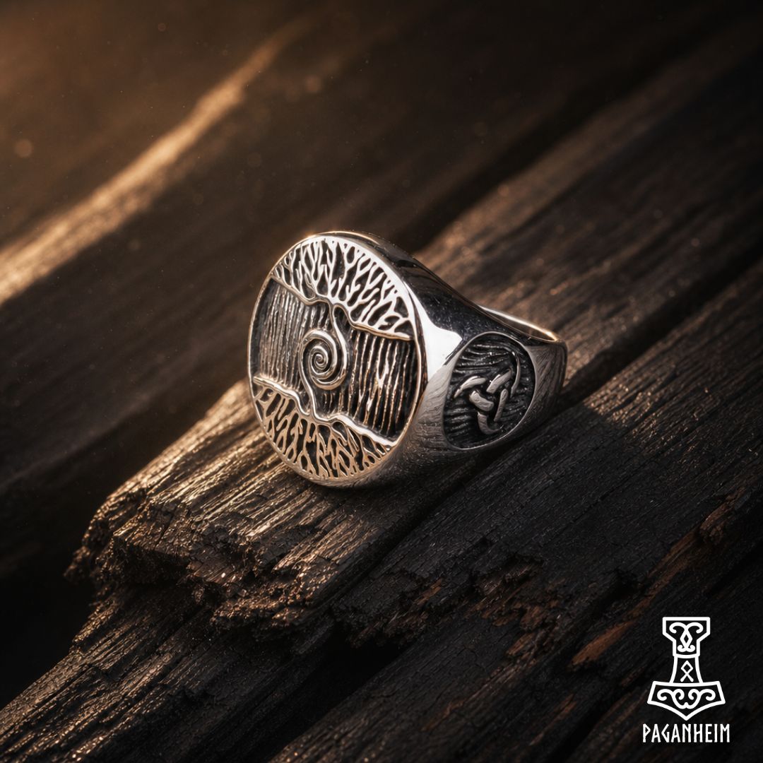Closeup of Yggdrasil ring showing detailed tree engraving and textured background.