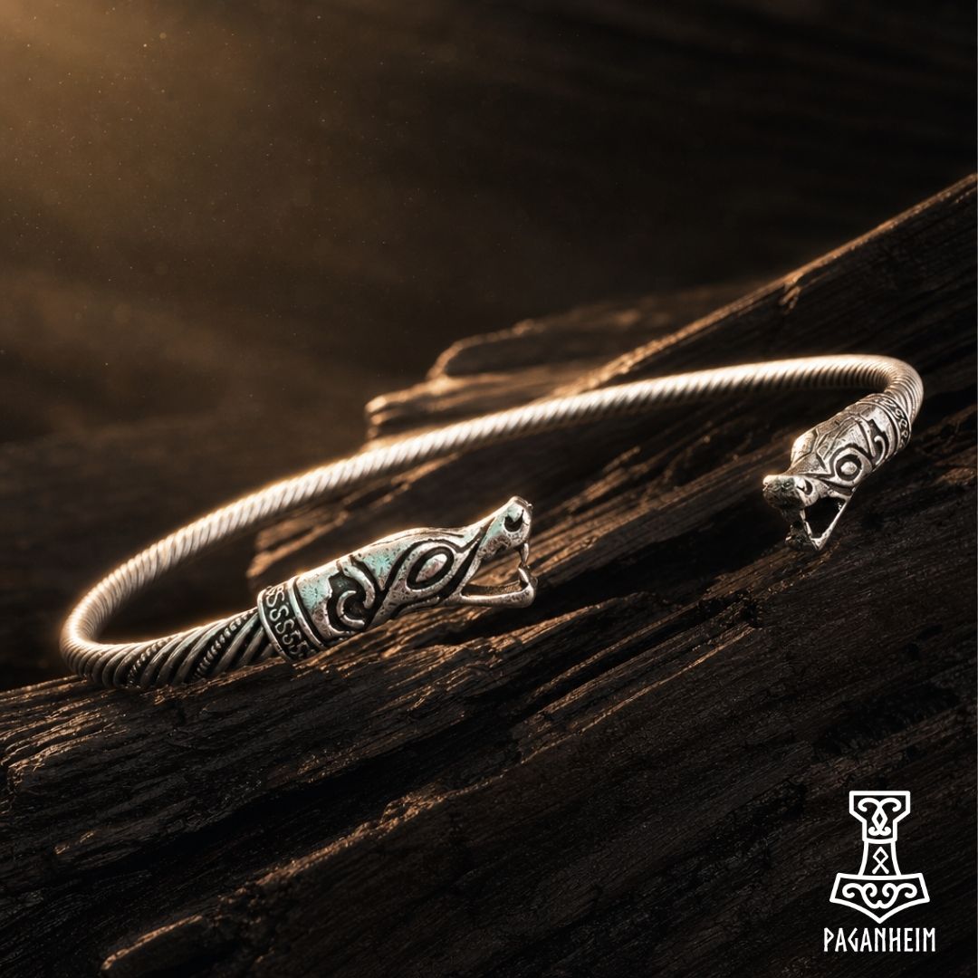 Bronze Viking Age neck ring featuring twisted band and serpent head terminals