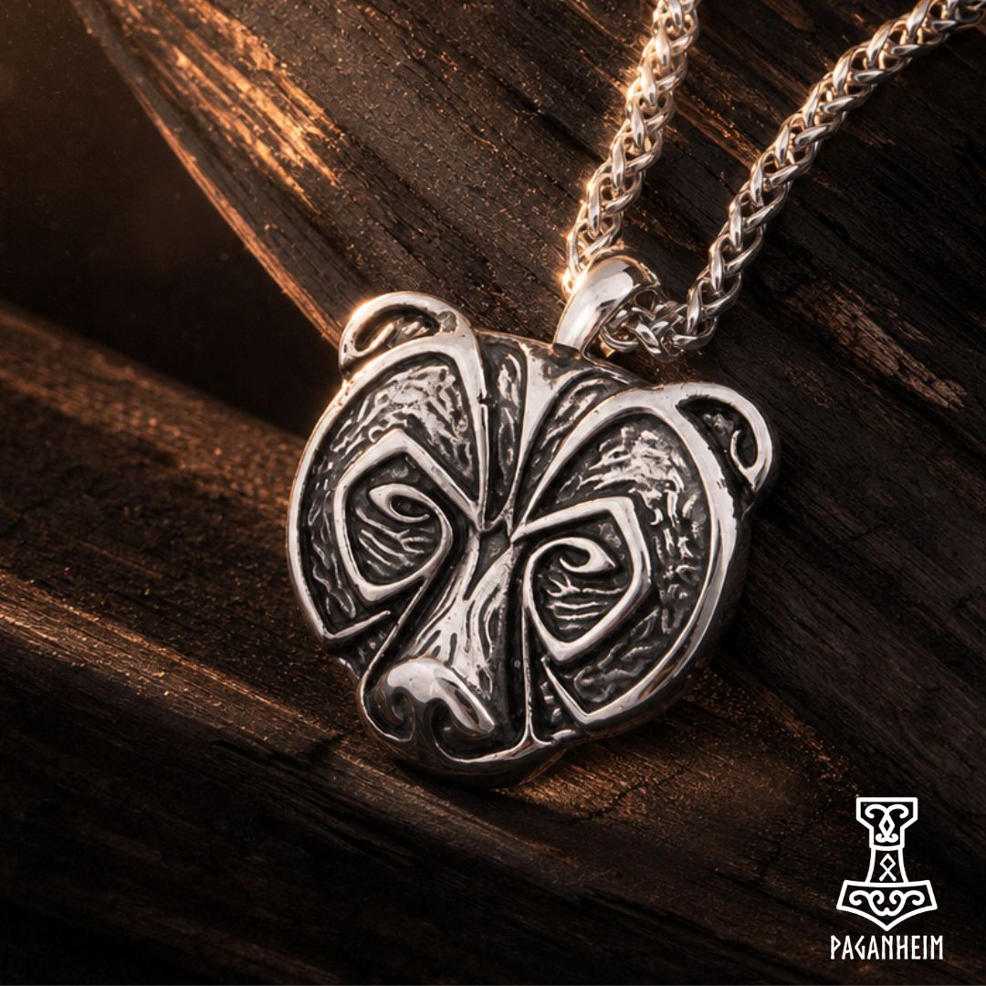 Closeup of Bjǫrn Hítdœlakappi necklace showing engraved bear design