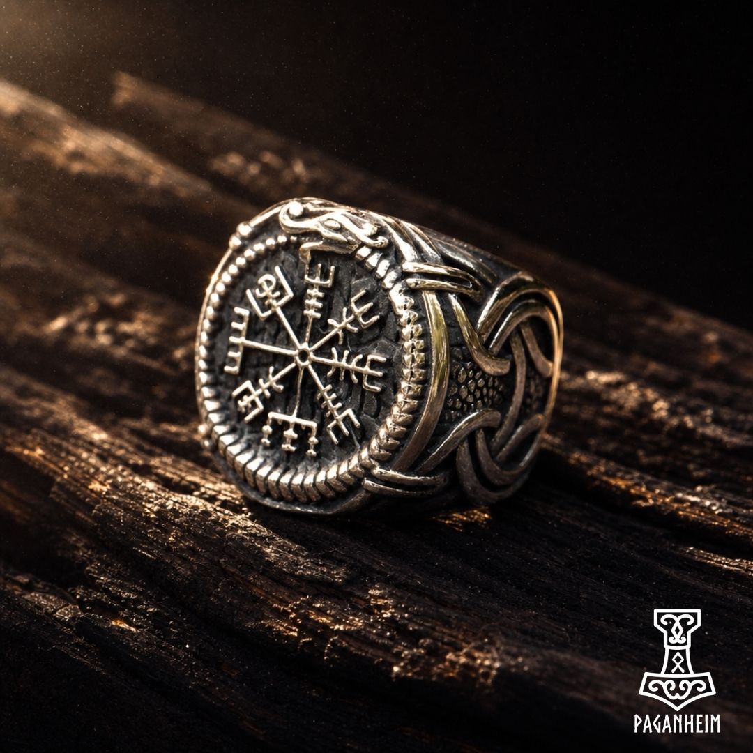Ring featuring Vegvísir symbol encircled by serpent biting its tail