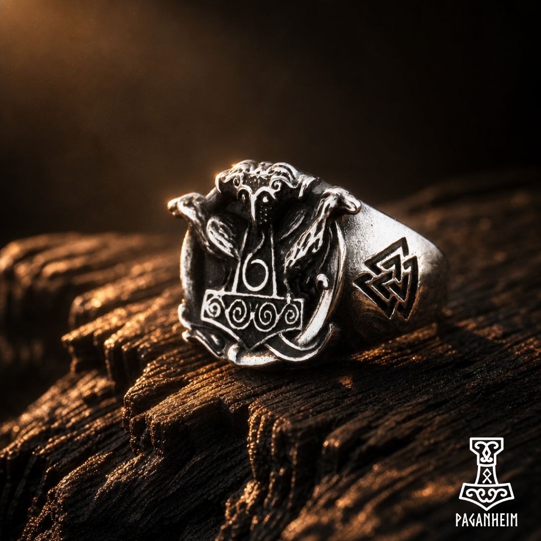 Metal ring featuring Thor’s hammer flanked by two raven heads