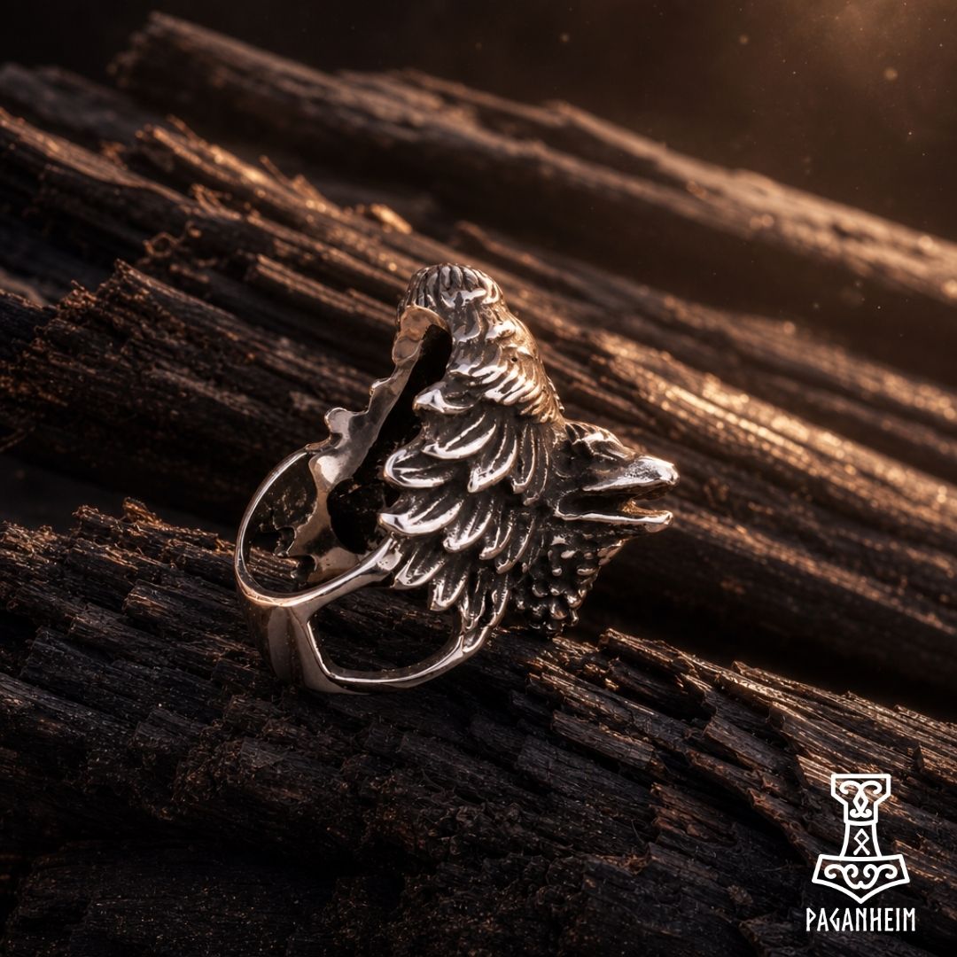Closeup of Norse ring showing detailed feathers and beaks of Huginn and Muninn