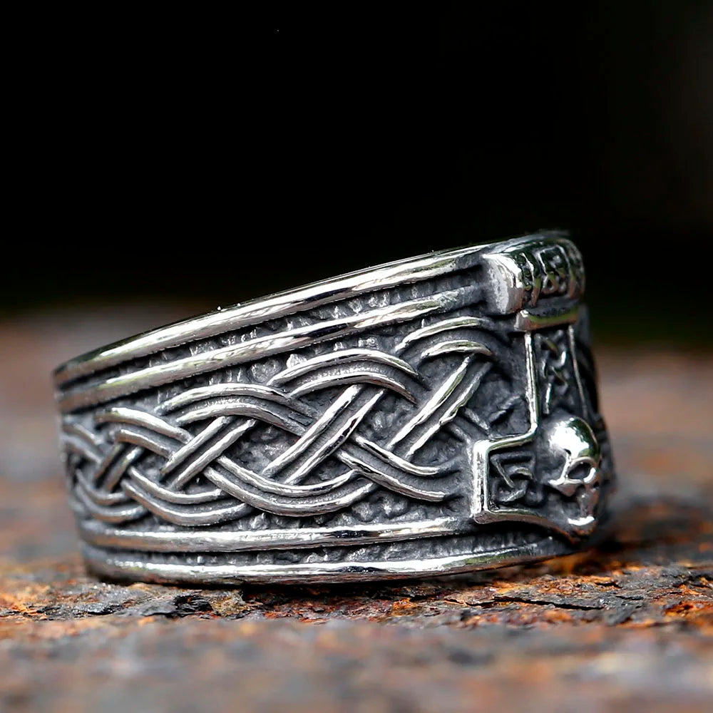 Mjölnir ring featuring skull base and intricate Wyrd web design
