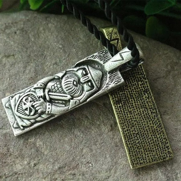Gothic-style pendant depicting Perun with sword, shield, and Sowilo rune.