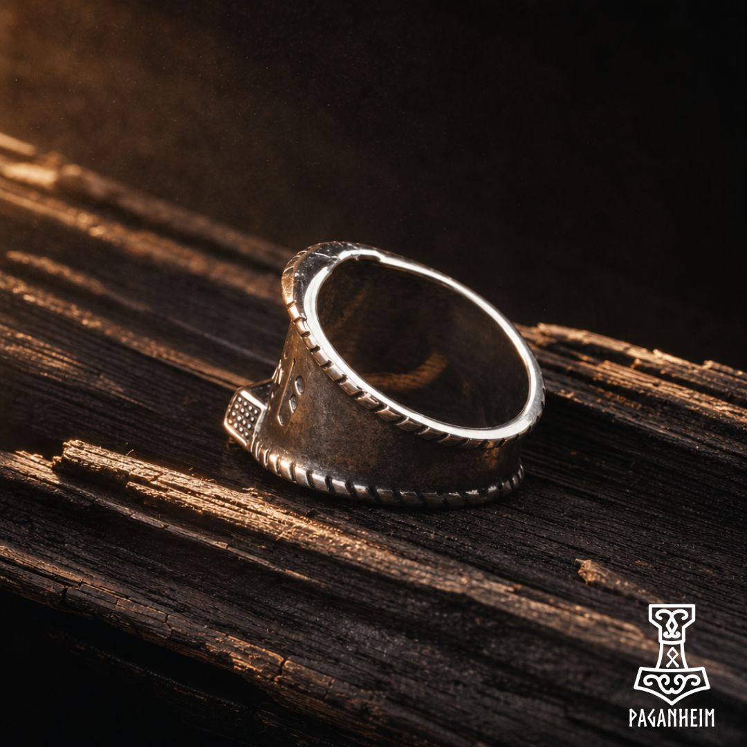 Norse‑inspired ring featuring Mjölnir symbol and engraved runes