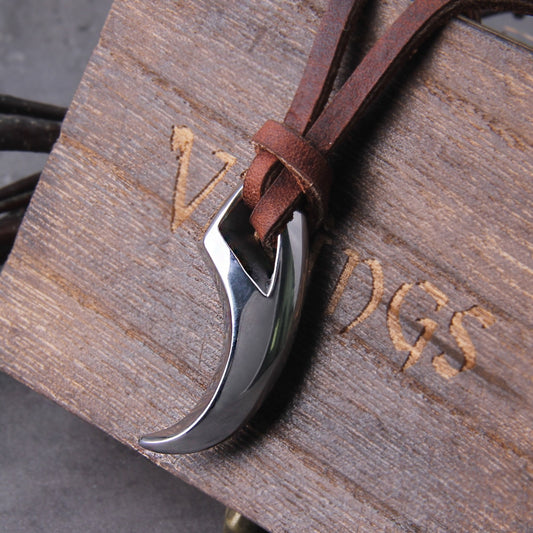 Leather necklace with a stainless steel pendant in the shape of a wolf's tooth, inspired by the wolf Fenrir, son of Loki.