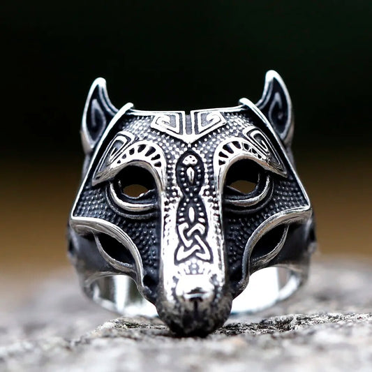 Embrace the symbolic weight of Fenrir's destiny with this intricately crafted ring. Detailed Old Norse engravings adorn the captivating portrayal of Fenrir's head, showcasing the triquetra symbol on its side. This ring signifies the complex duality of Norse mythology, embodying Fenrir's eternal oath of revenge against Odin and the Aesir gods.