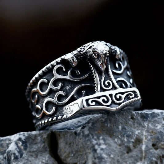 A close-up of a ring inspired by Norse tradition, resembling Thor's hammer.