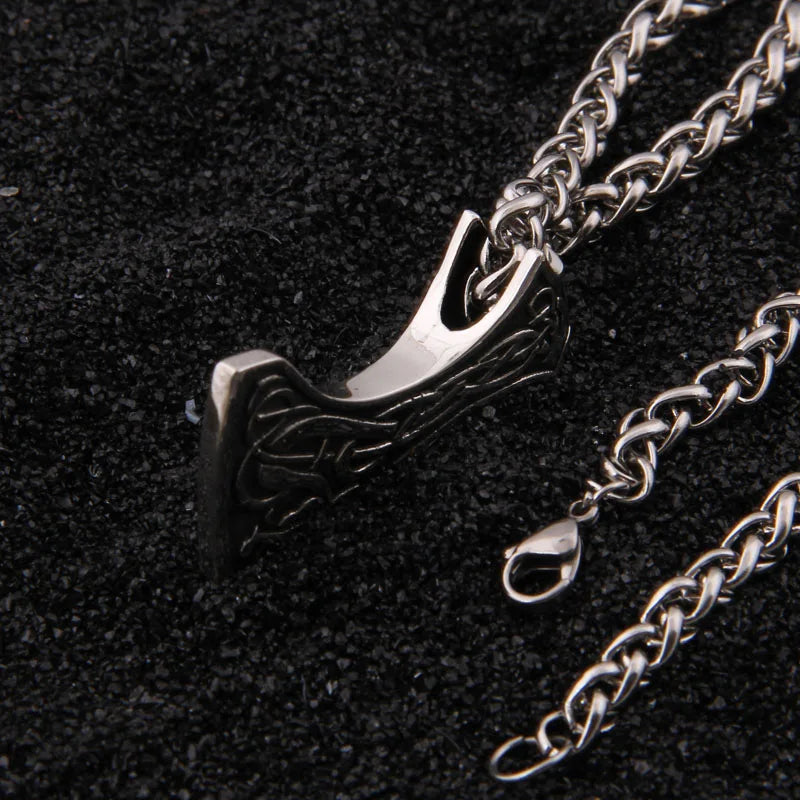 S925 Viking axe pendant with intricate Norse Urnes design.