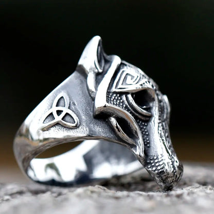 Fenrir's Oath Jewelry captivates with its symbolic triquetra etching and detailed Norse engravings. The ring embodies the profound duality of Fenrir's spirit, showcasing his upward-pointing ears and hollow eye sockets. Discover the intricate symbolism and wear the essence of Fenrir's eternal oath against the Aesir.