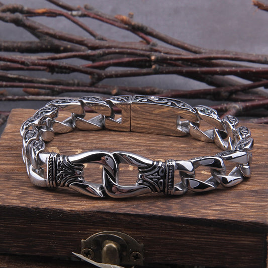 Old Norse Mythology, Viking & Celtic Jewelry Piece Inspired by the 'Binding of Fenrir' from the Poetic Edda - A durable silver bracelet with a chain and clasp. Inspired by Norse mythology, it features an intricate weave pattern symbolizing friendship, loyalty, and happiness. Crafted from high-quality stainless steel, it embodies strength and endurance.