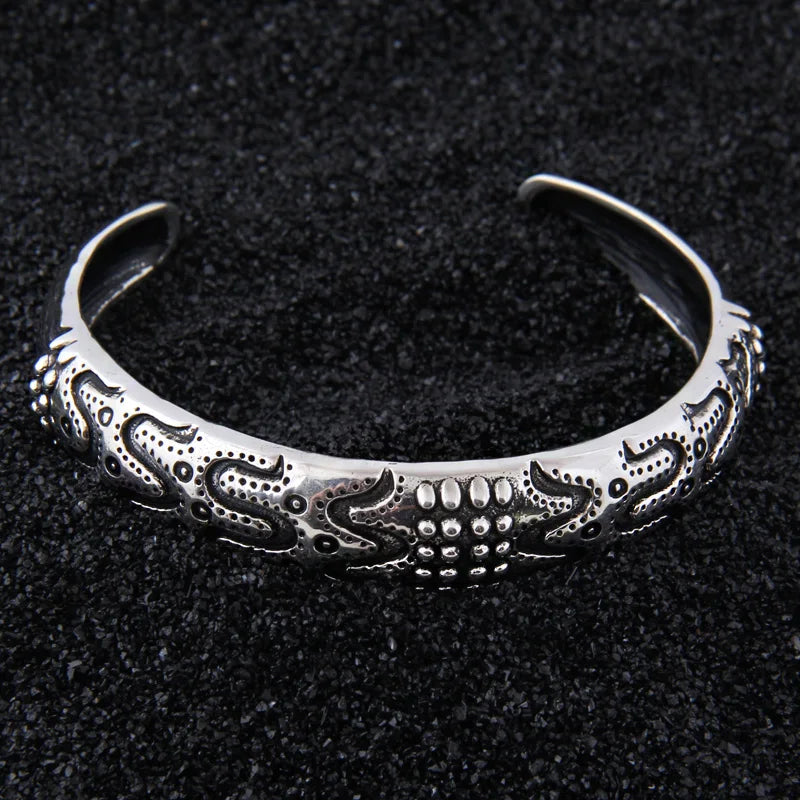 Adjustable silver arm ring inspired by historical Viking designs from Brahesminde and Birka.