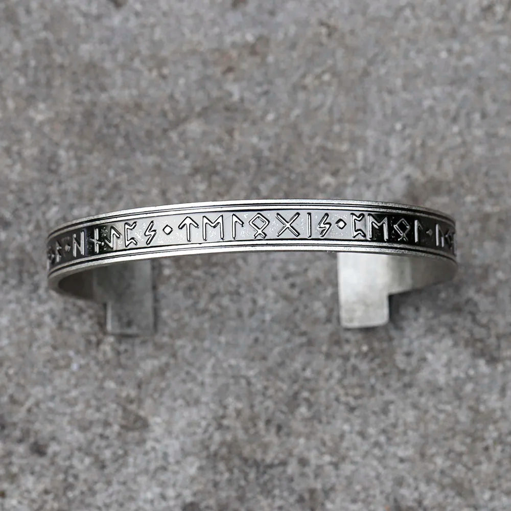 Adjustable arm ring with engraved Elder Futhark runes across the band.