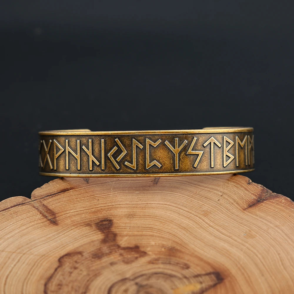 Adjustable gold bangle with Elder Futhark runes