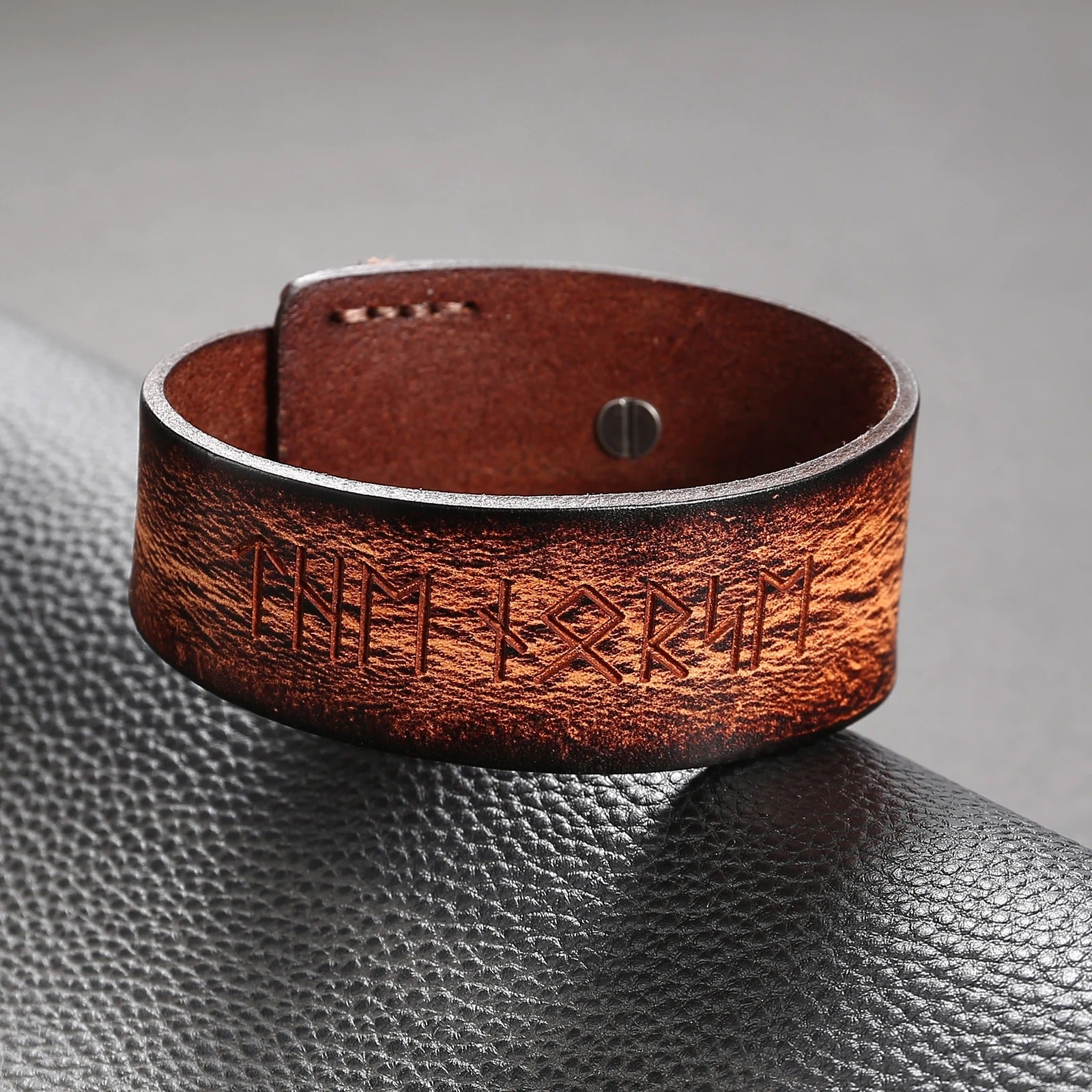 Stylish runic bracelet paired with modern men's attire