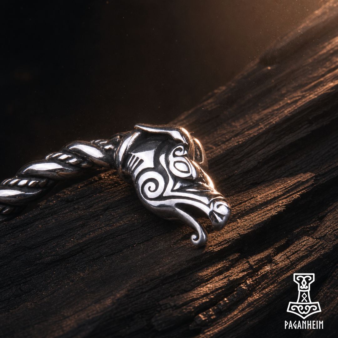 Stainless steel bracelet with dragon head design and twisted pattern.