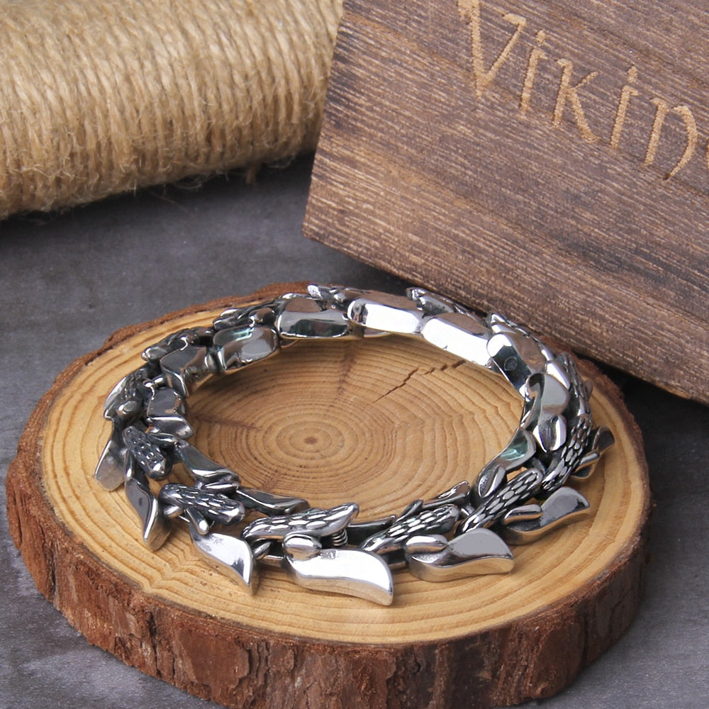 Durable and fade-resistant stainless steel accessory, coiling around your wrist with the power of Jörmungandr.