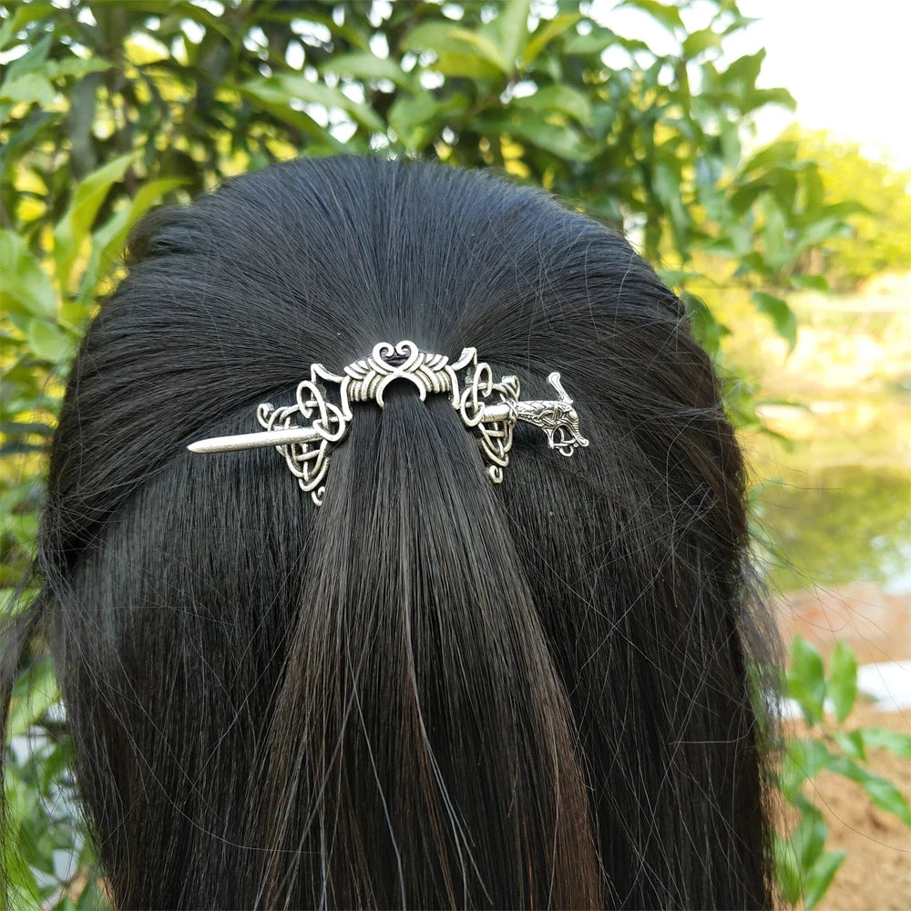 Elegant hair pin brooch featuring classic Celtic artistry.