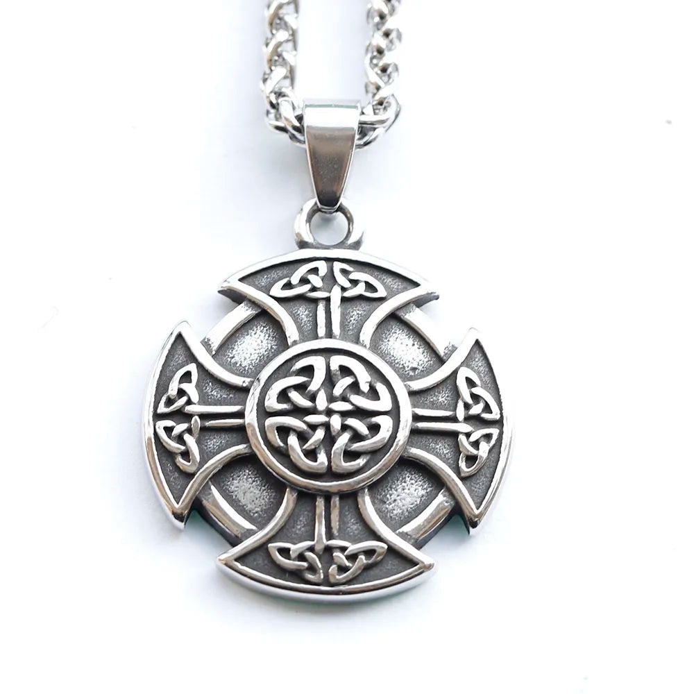 Amulet showcasing a Celtic cross, symbolizing spiritual connection.