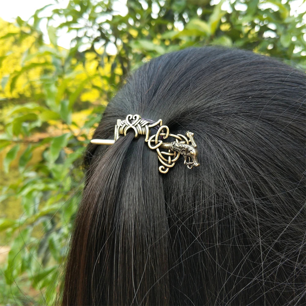 Hair pin brooch showcasing classic Celtic artistry and patterns.