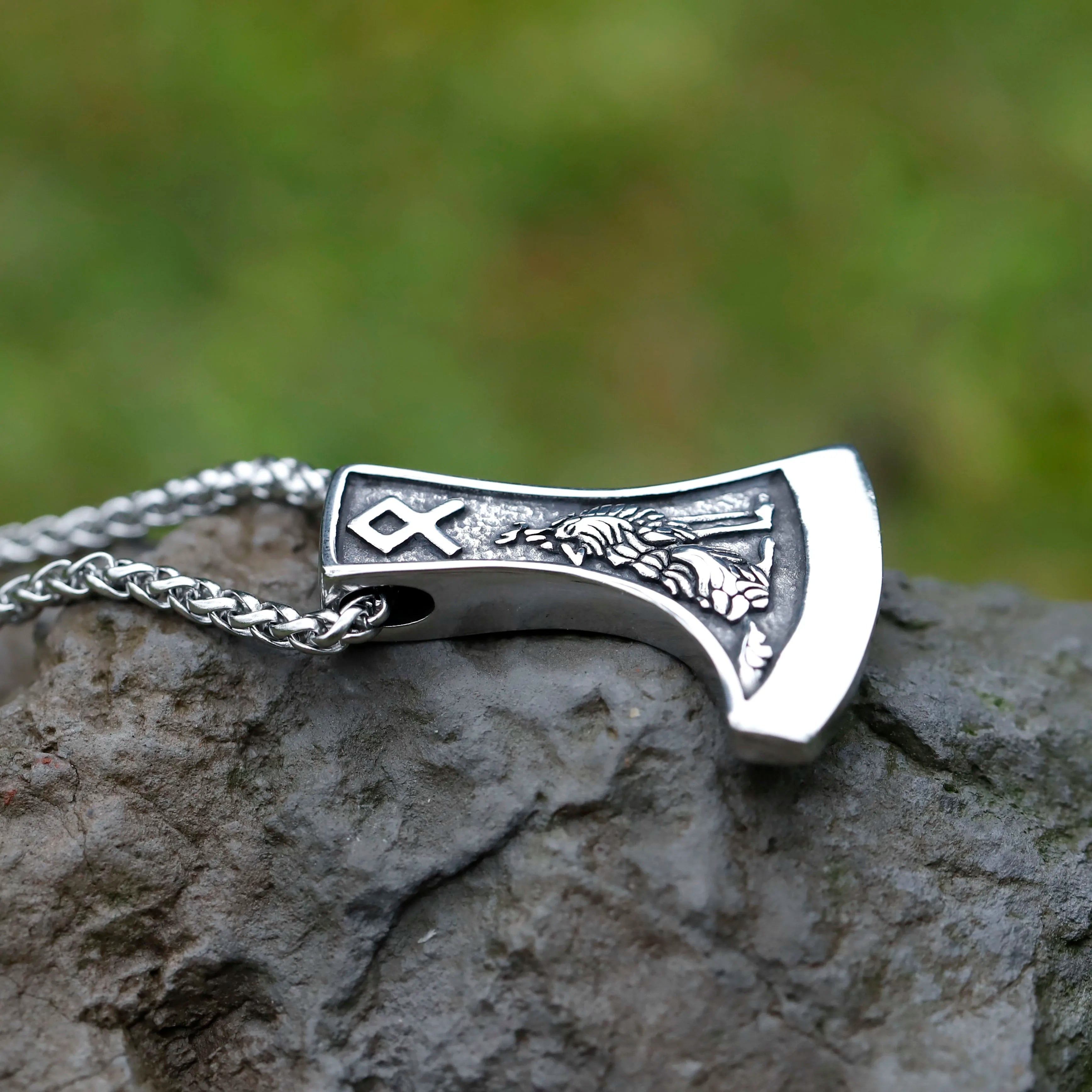 Norse Dane axe amulet with Othala and Algiz runes on opposite sides.