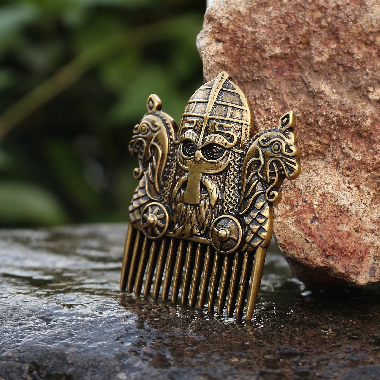 Bronze-gold hair comb featuring dragon prowls from drakkar longships.