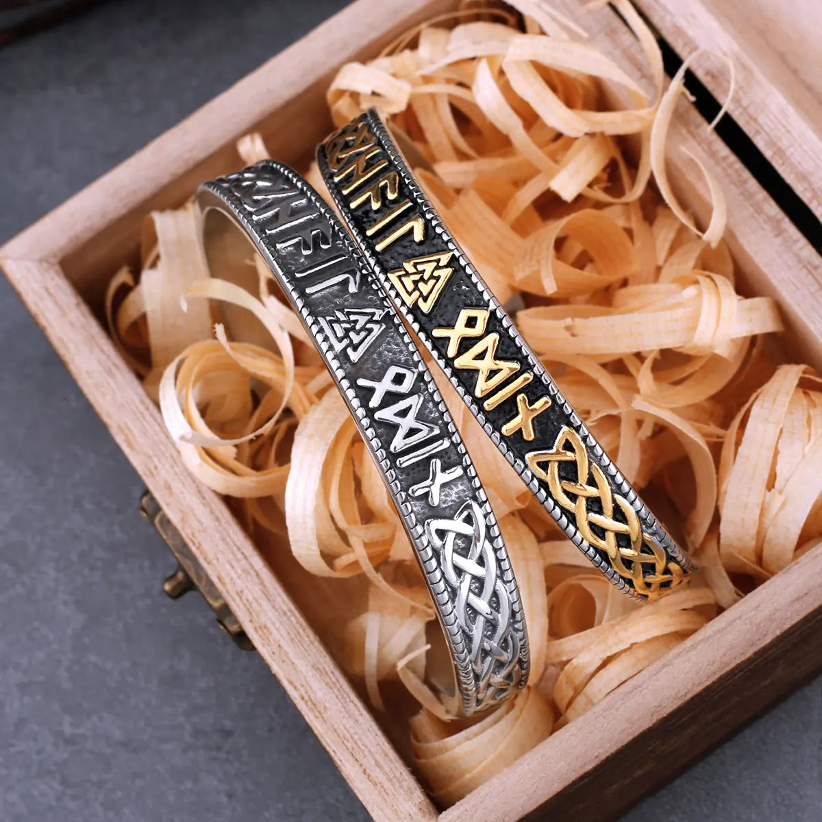 Elder Futhark runes engraved on Norse Valknut bangle.