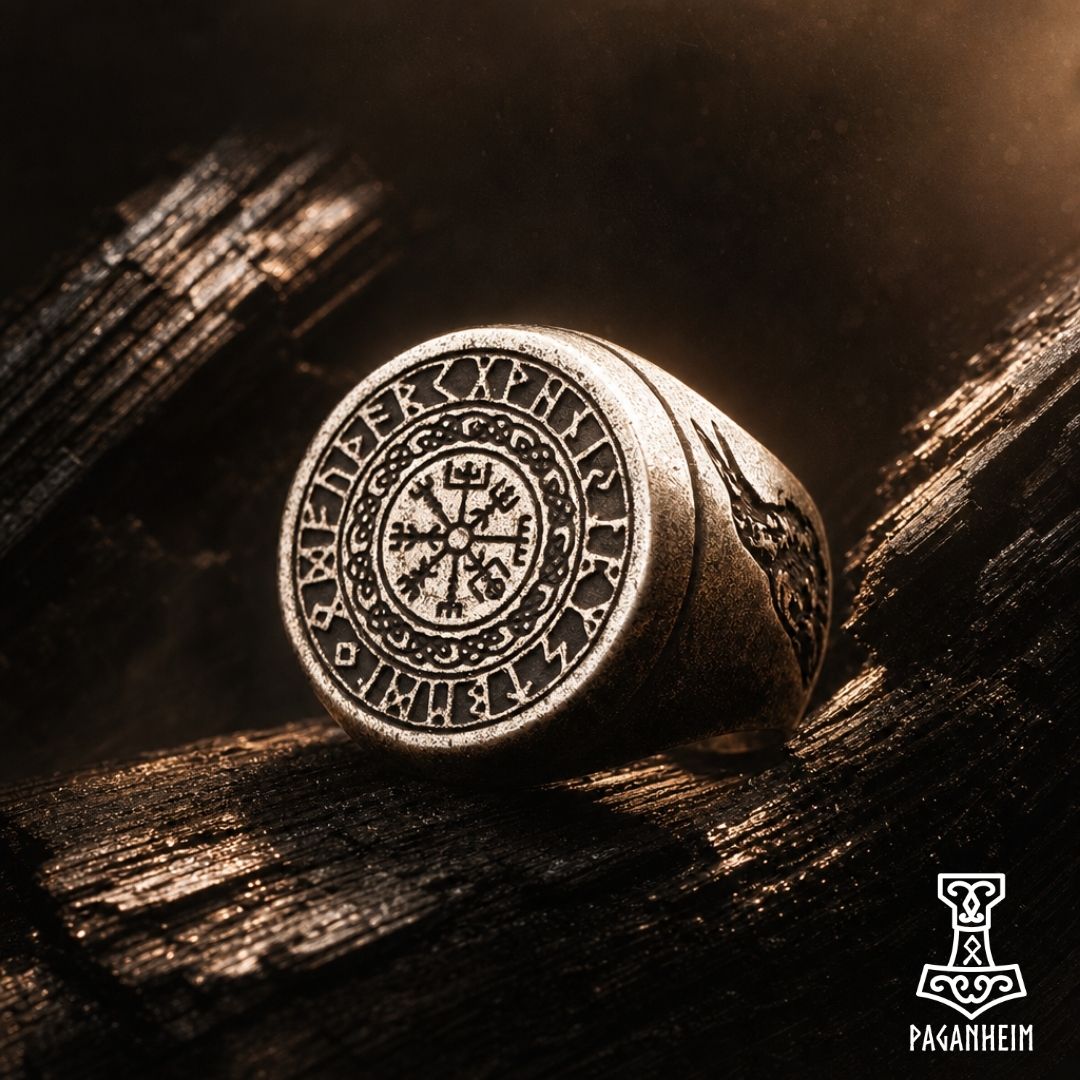 Closeup of metal ring showing Icelandic compass stave and runic border