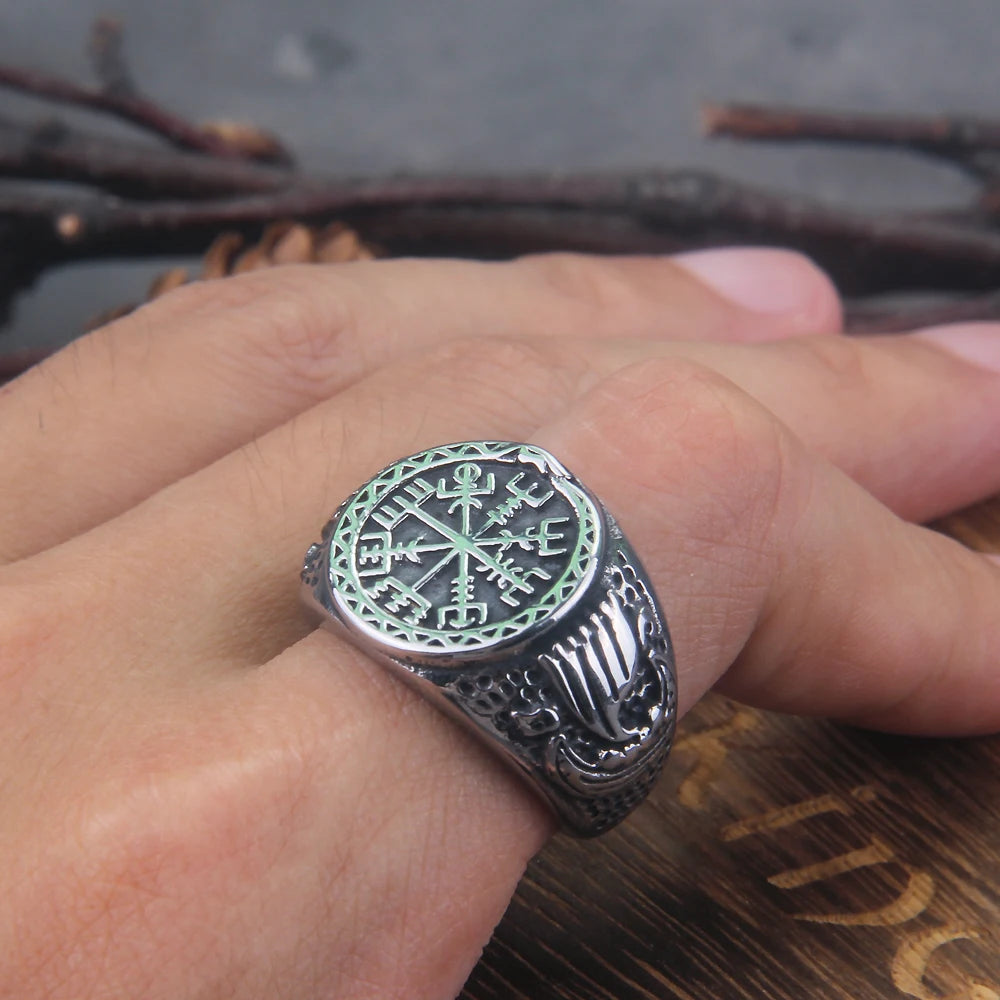 Engraved ring with Norse longship and Vegvisir design.