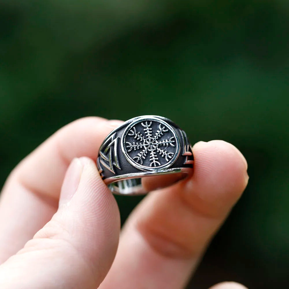 Intricate Helm of Awe ring with engravings of Valknut symbols.