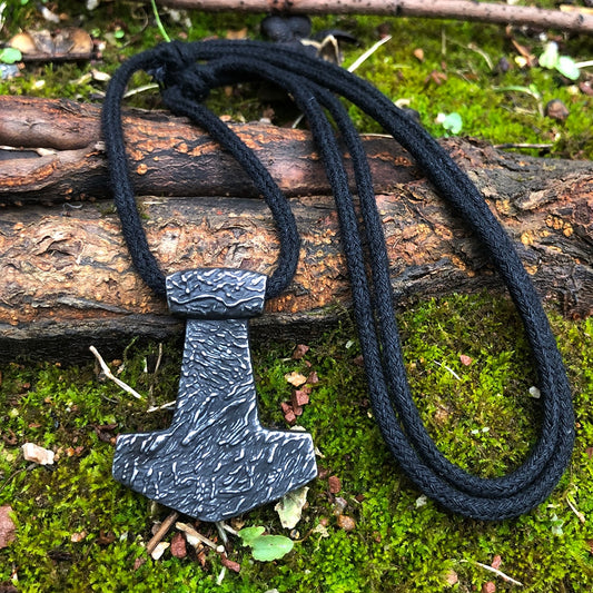 Aged Thor Hammer Pendant, Eroded Mjolnir with timeless allure, echoing the strength of the Viking Age.