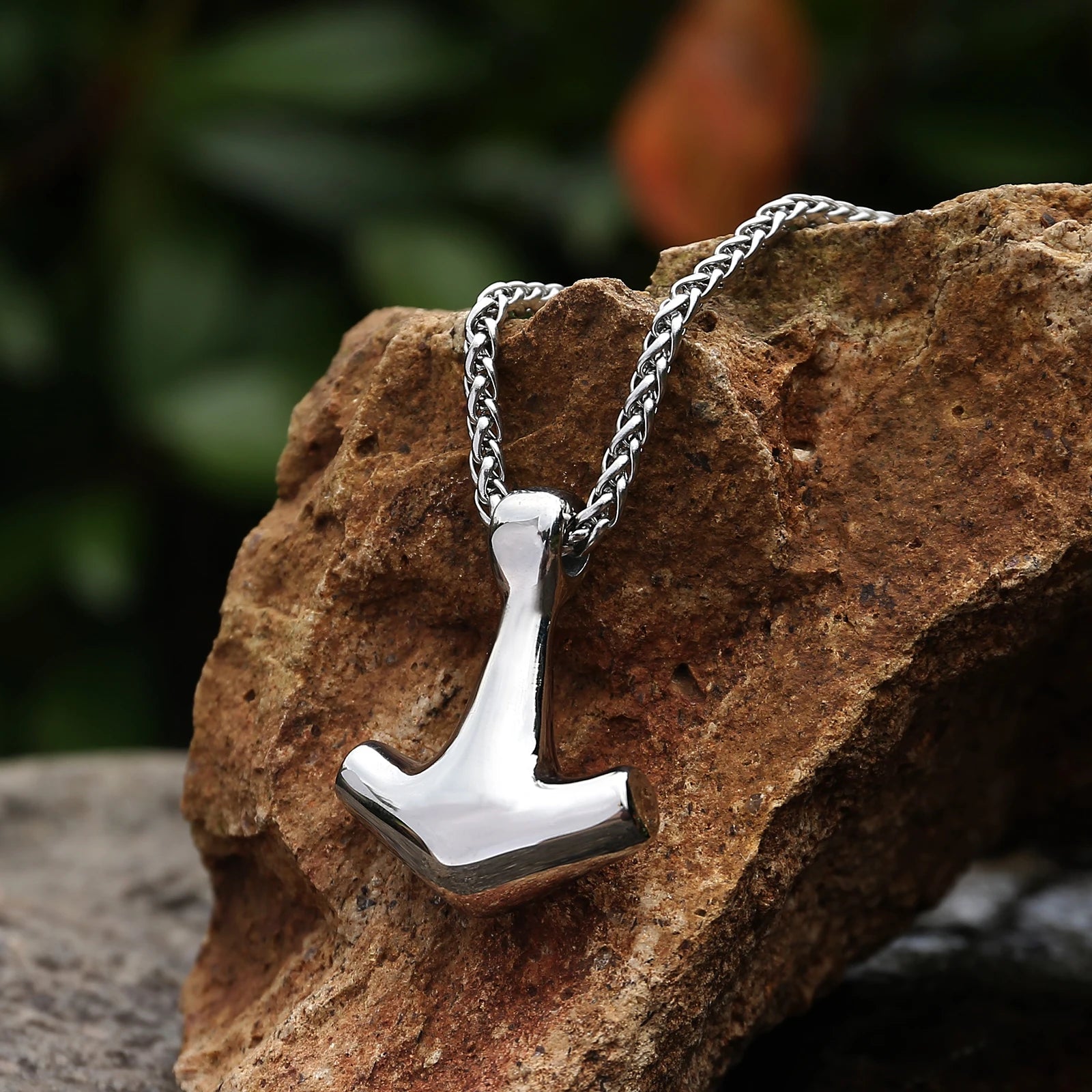 Simplistic Mjölnir pendant inspired by the Fitjar discovery, in polished stainless steel.