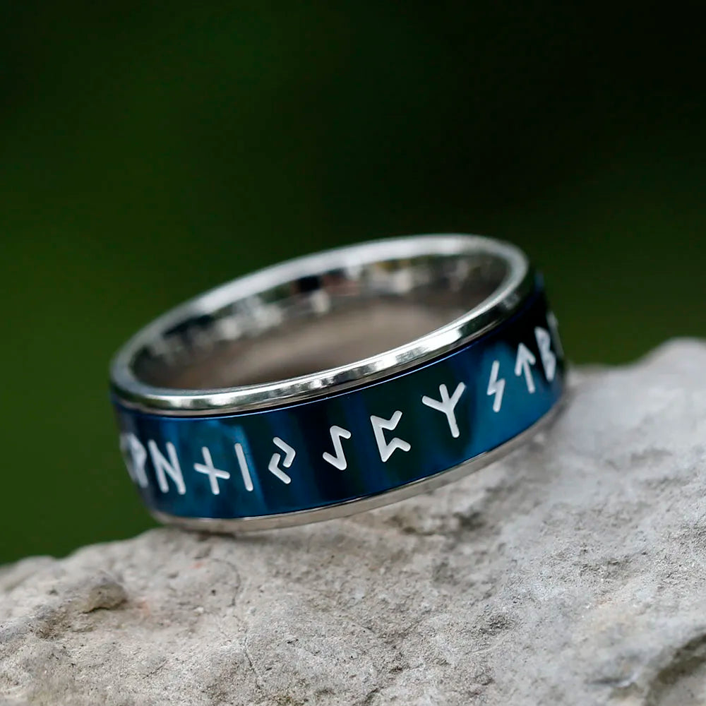 Glossy blue ring with Elder Futhark runes, allowing for rotation.