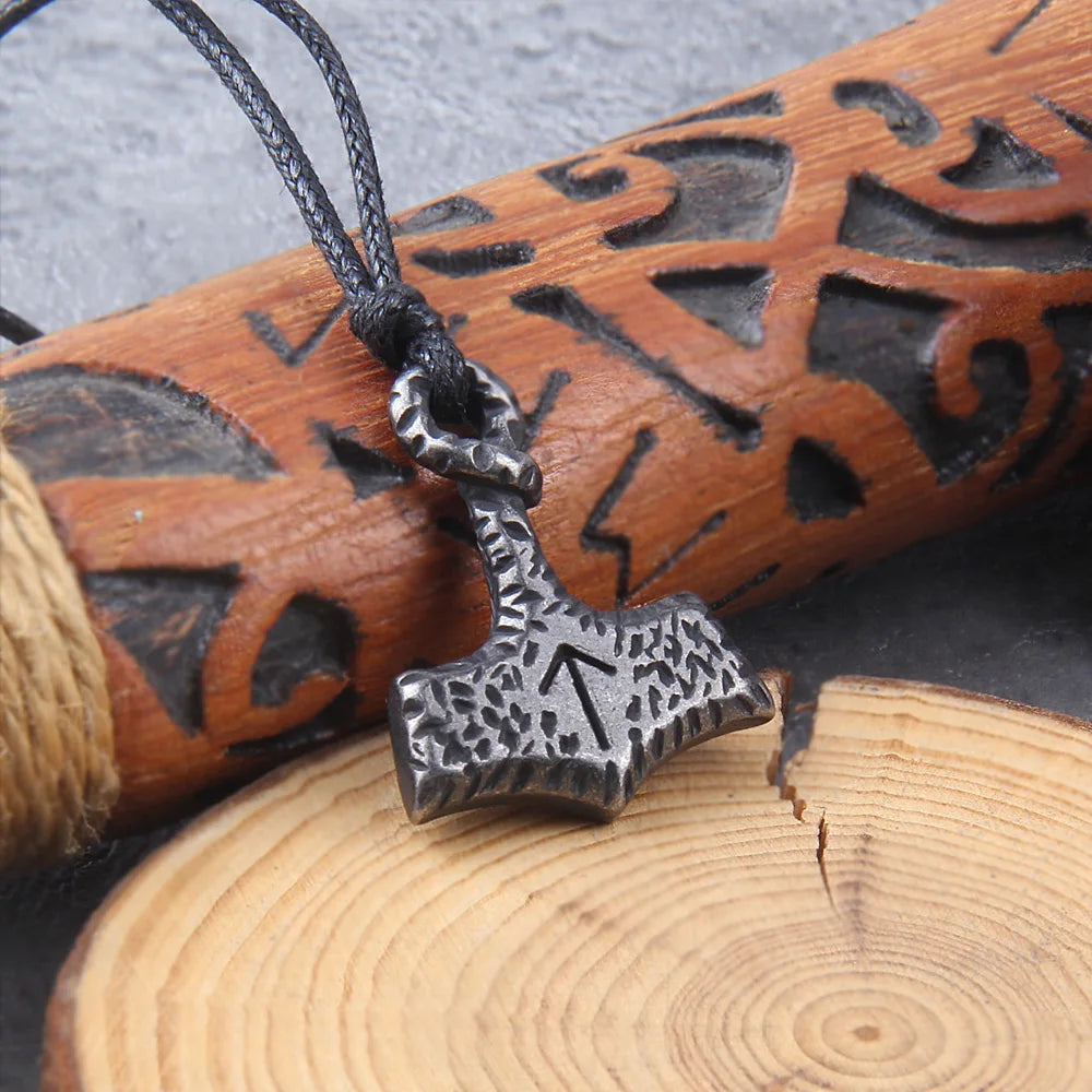 Hand-forged style Mjölnir pendant symbolizing Thor and Tyr.