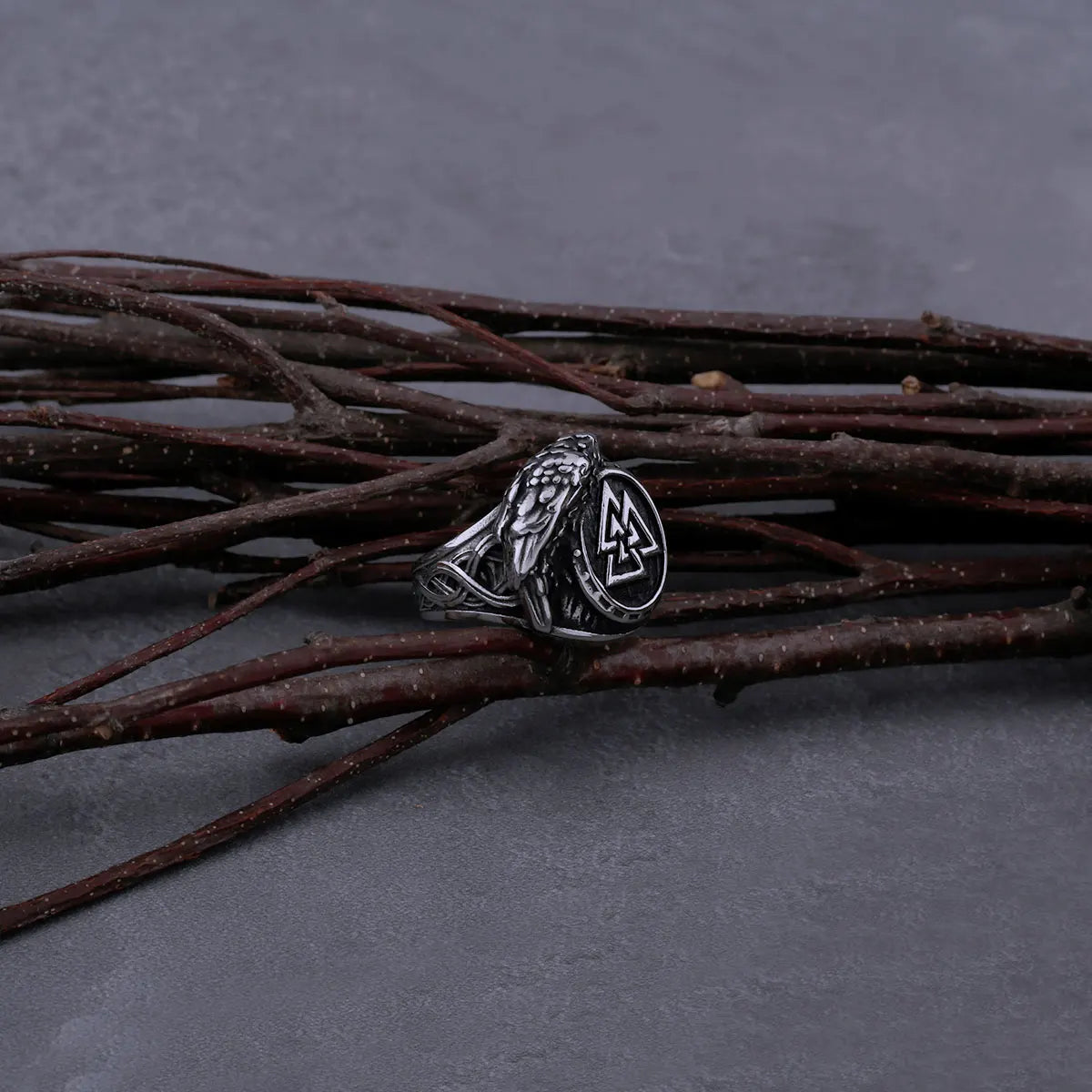 Raven wing design on the Valknut ring representing wisdom in Norse mythology.