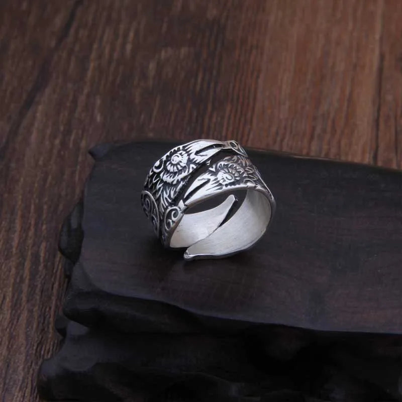 Sterling Silver spiral ring with Norse motifs of Hugin, Munin, and Triquetra engravings.