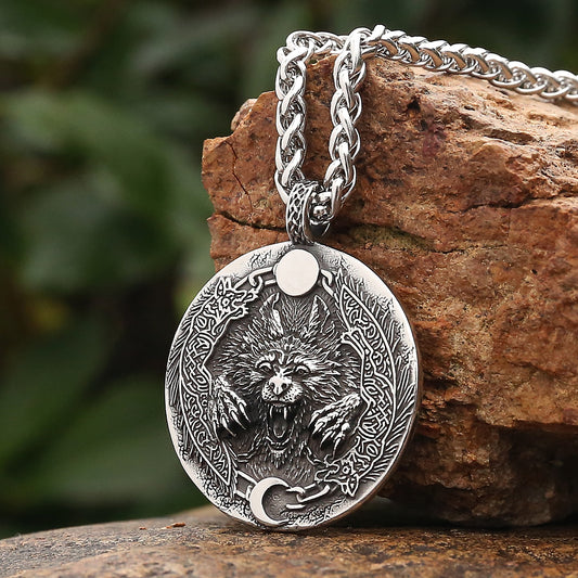 Vánagandr Fenrir Amulet - A captivating etching of Fenrir beneath moon and sun in intricate Norse jewelry.