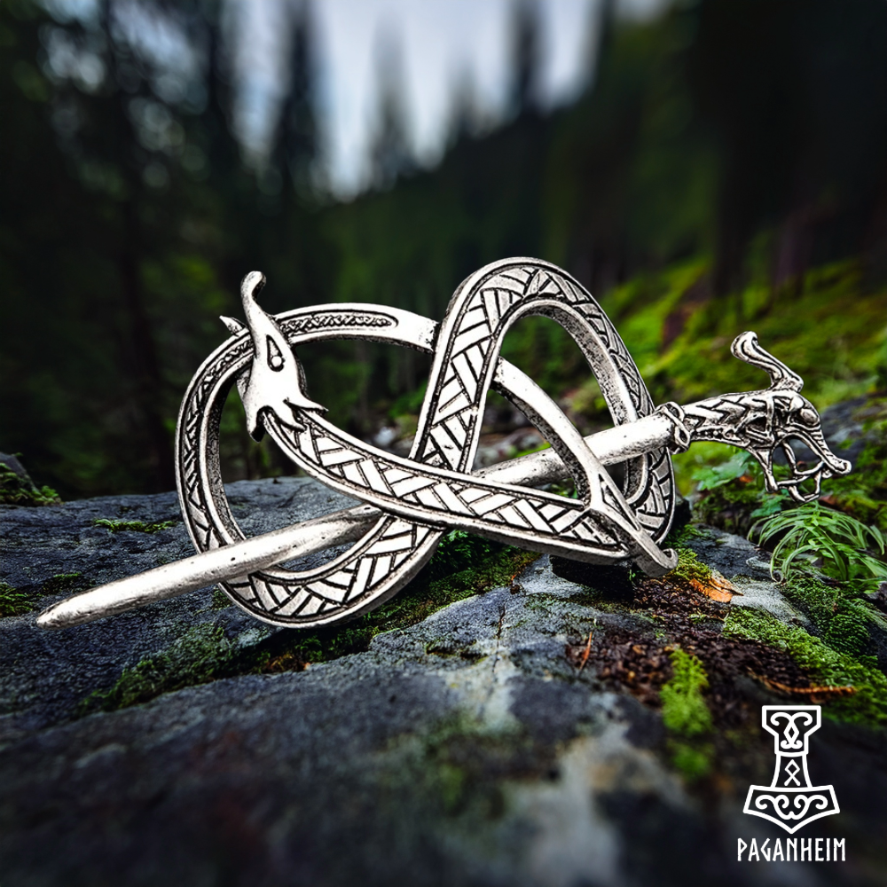 Jelling-style hairpin with intricately carved dragon head, reflecting Norse cultural motifs.