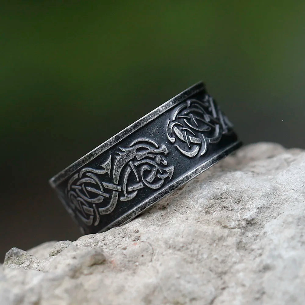 Aged-look ring with Jelling-style Old Norse motifs.