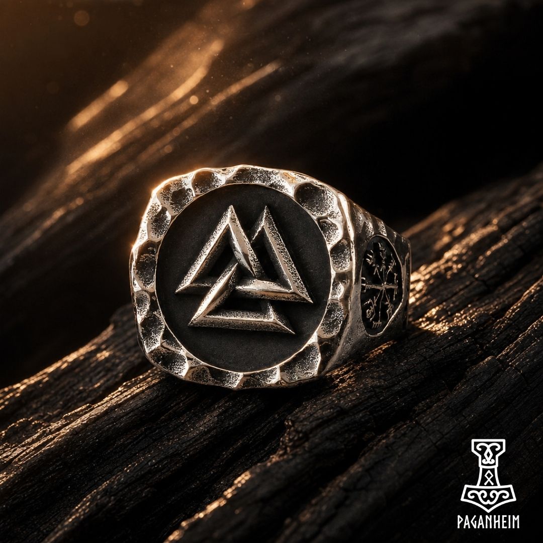 Metal ring featuring Valknut symbol with hammered texture
