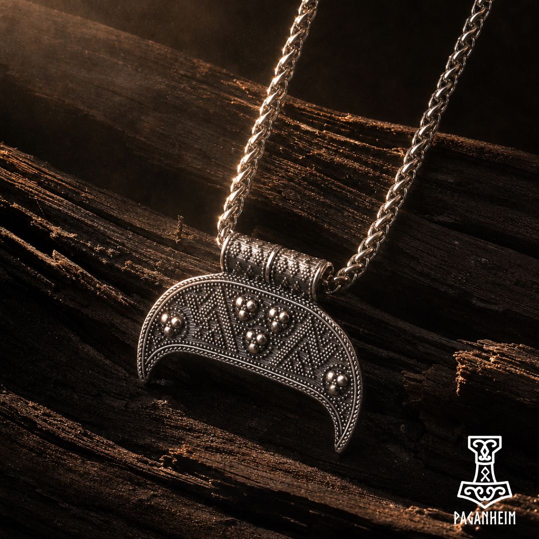 Crescent-shaped lunula pendant with granulated dot detailing