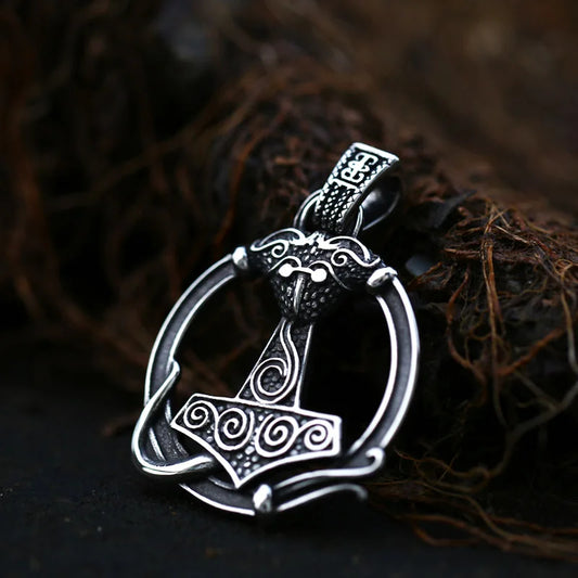A replica pendant inspired by historical Mjolnir pendants from Skåne and Erikstorp.