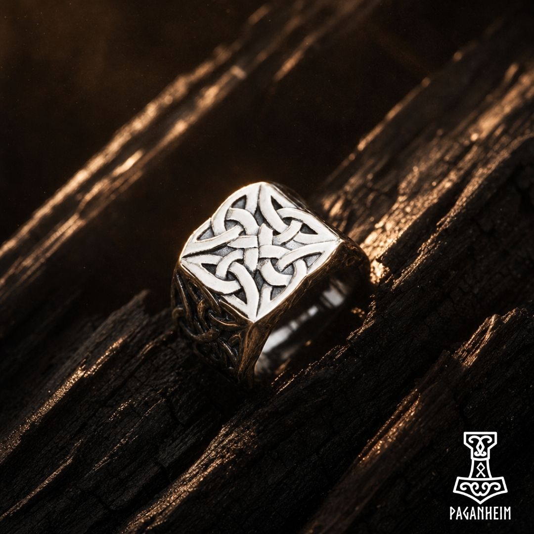 Stainless steel ring featuring square crown with intricate Celtic knot design
