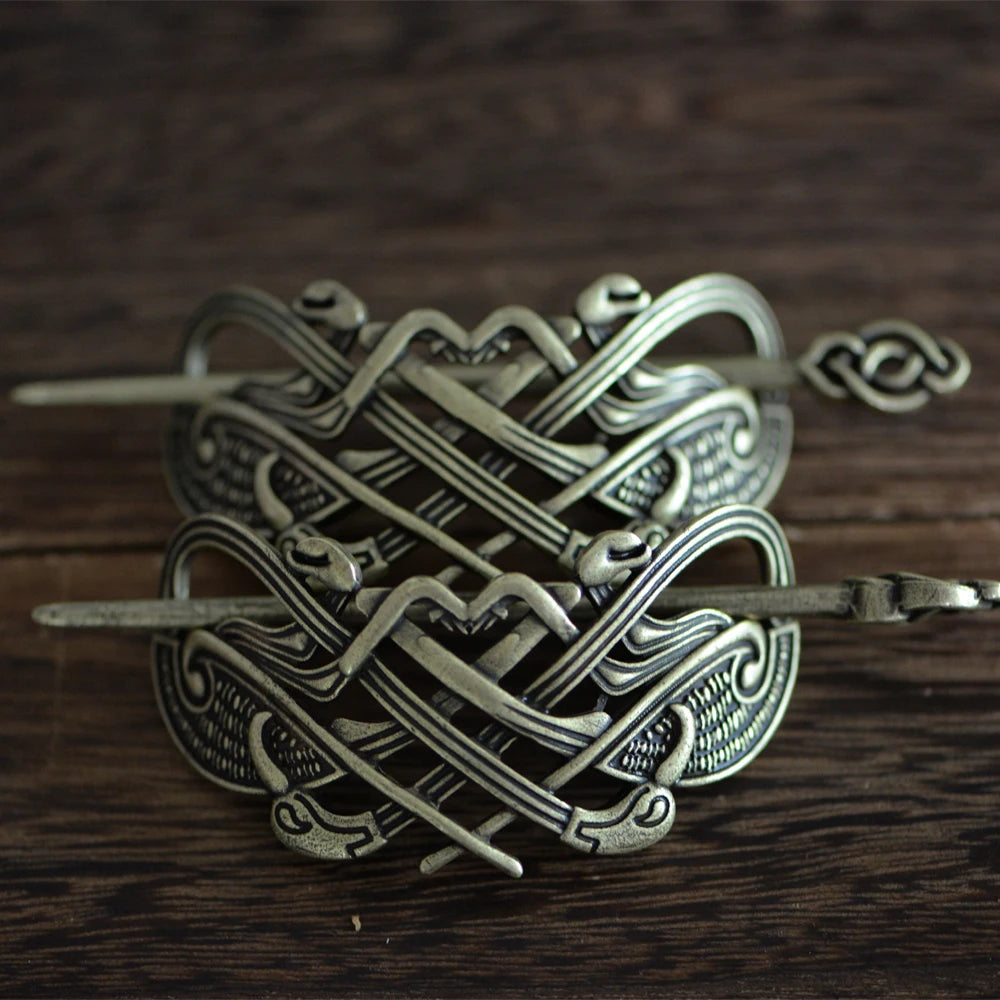 Norse-inspired hair pin featuring raven motifs and artistic intertwined beasts.